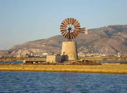 Windmill used for draining water from the salt flat basins, Trapani, Sicily - Louise M Harrington